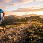 Trail runner performing weighted squats to enhance performance and protect joints